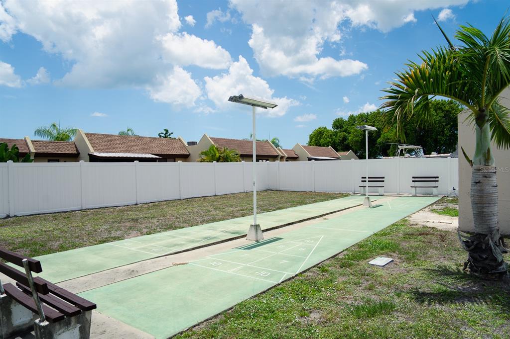 519 Albee Farm Road, Unit 110 Venice, FL 34285 - Photo 29 of 33 a view of a backyard