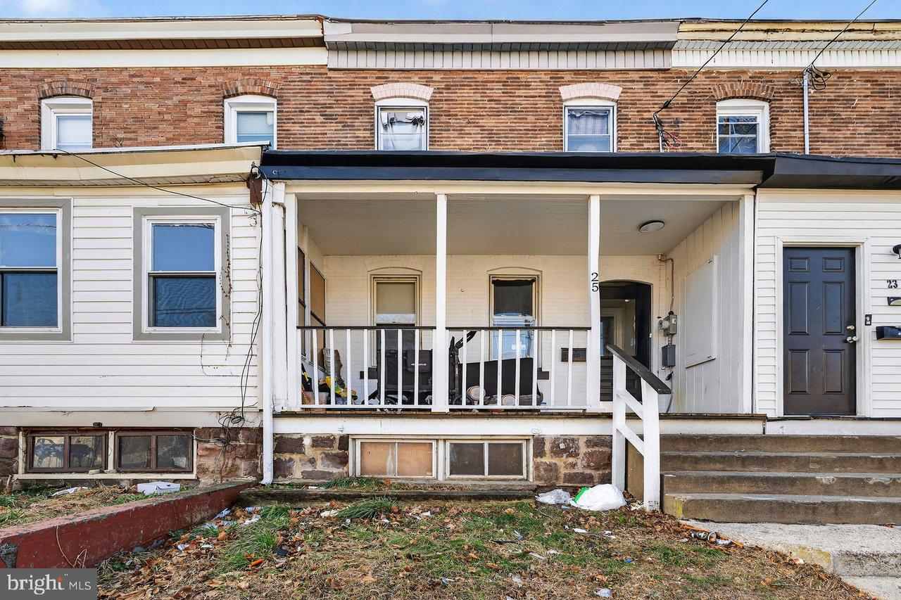12 Adella Avenue Hamilton, NJ 08609 - Photo 11 of 27 a view of a house with a small yard and wooden floor and fence