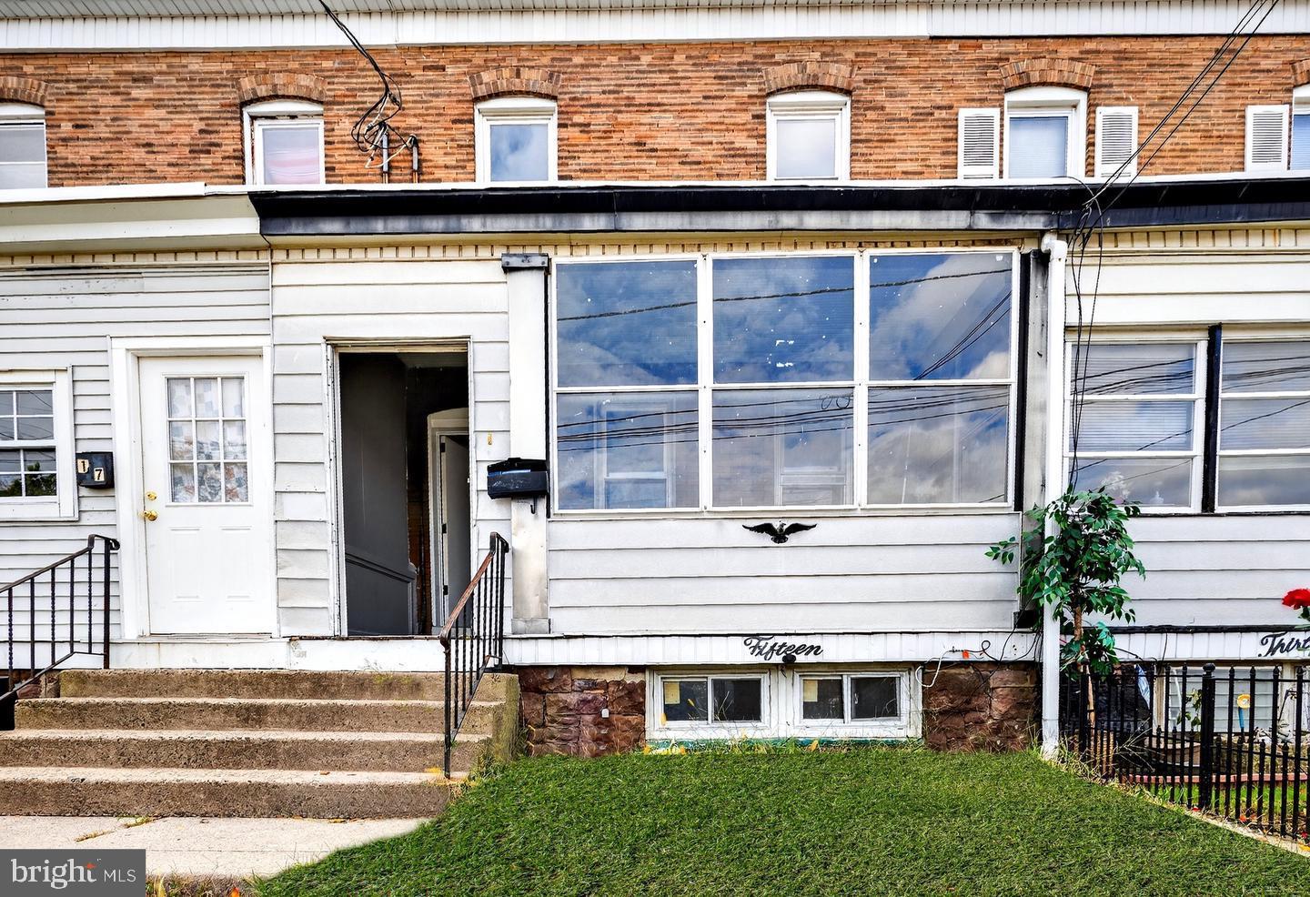 12 Adella Avenue Hamilton, NJ 08609 - Photo 2 of 27 a view of a house with a balcony