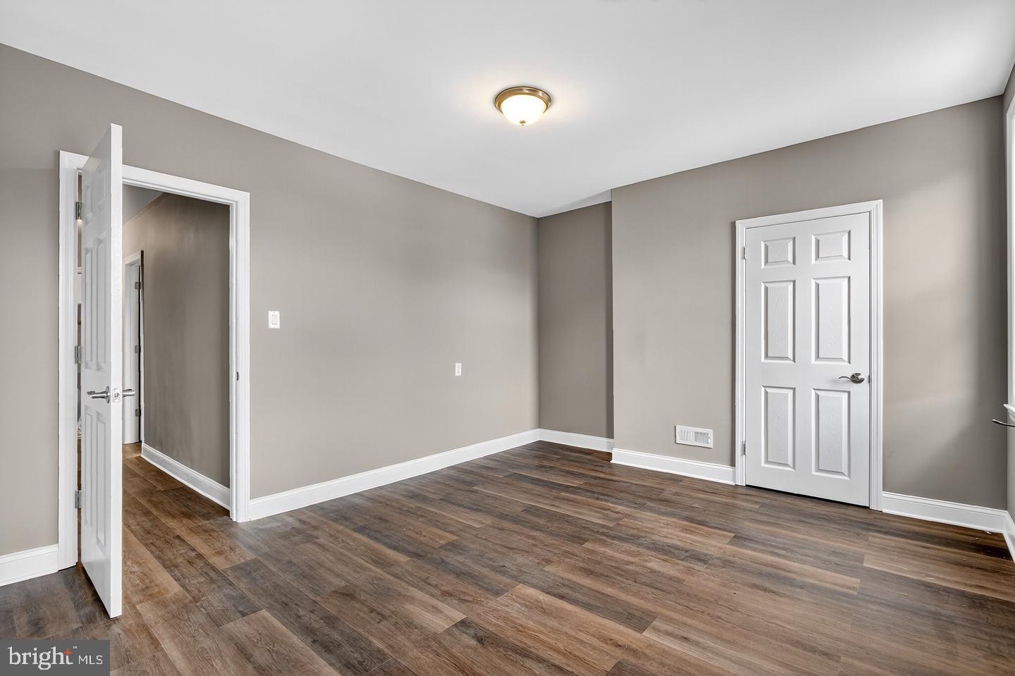 12 Adella Avenue Hamilton, NJ 08609 - Photo 21 of 27 a view of an empty room with wooden floor
