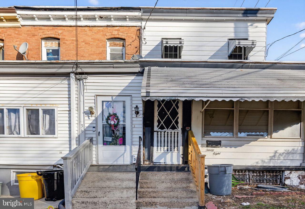 12 Adella Avenue Hamilton, NJ 08609 - Photo 3 of 27 a view of a house with a porch