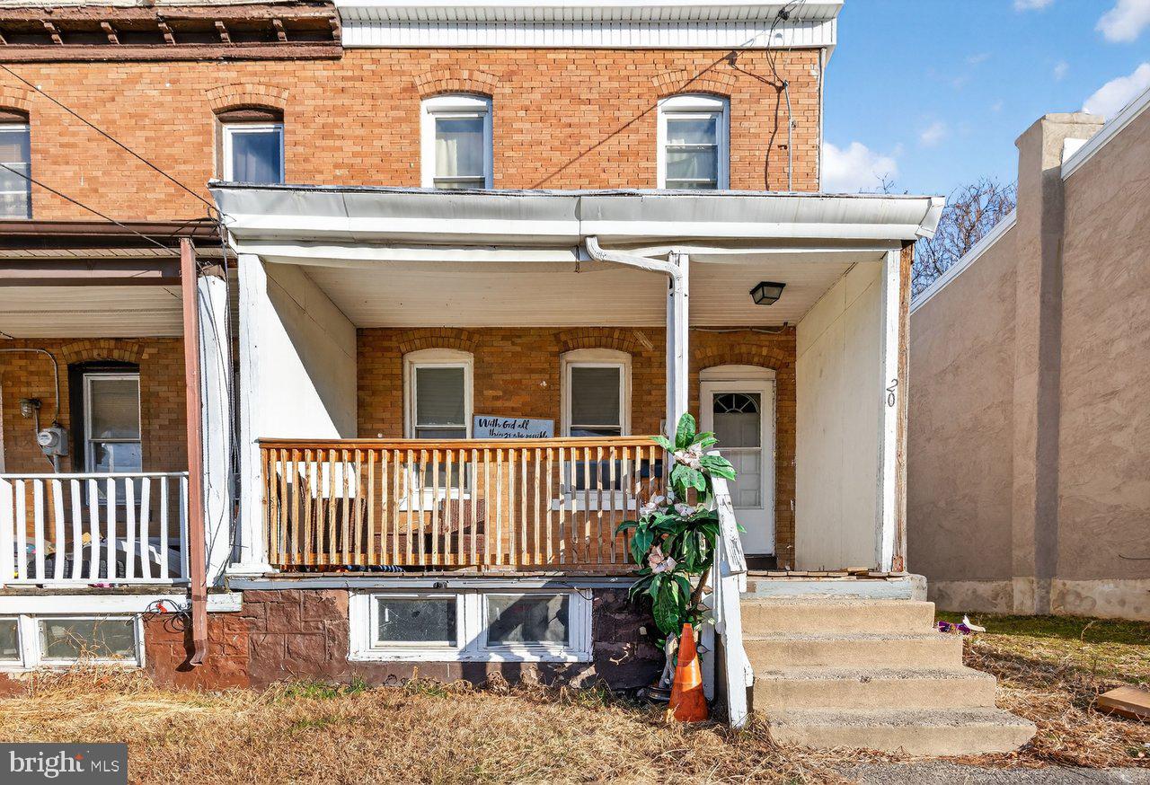 12 Adella Avenue Hamilton, NJ 08609 - Photo 8 of 27 front view of a house with a porch