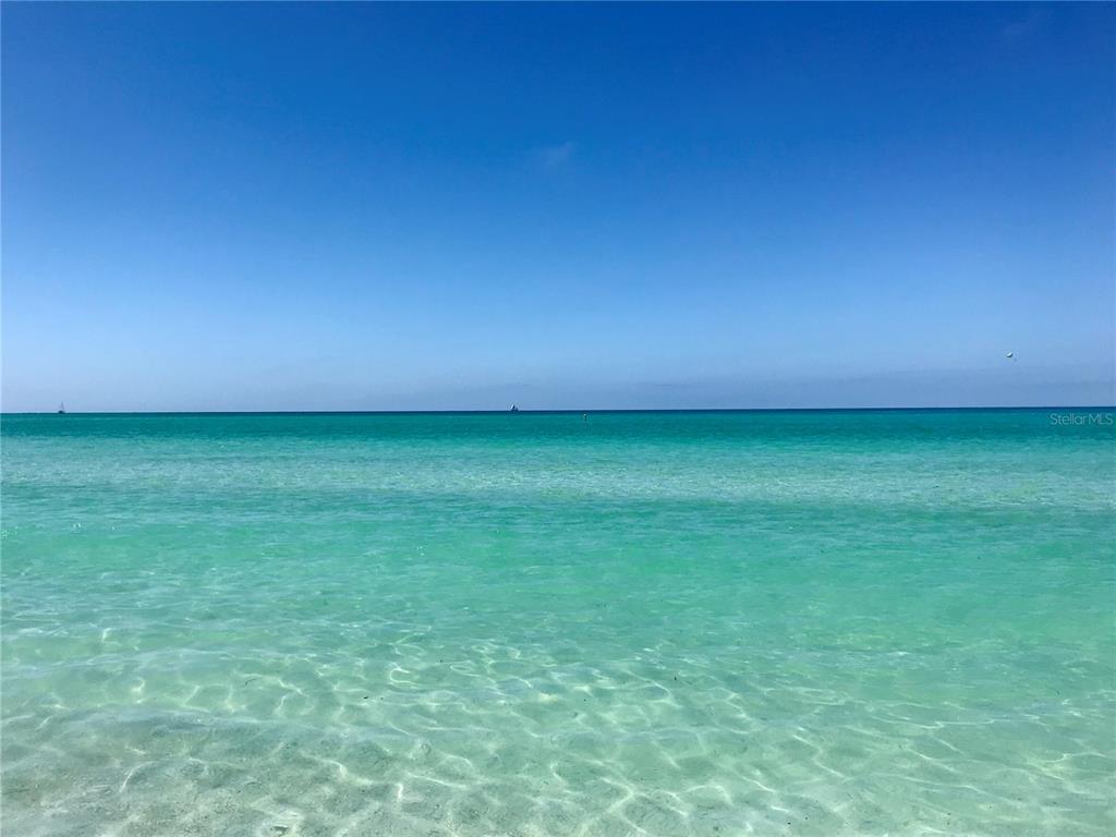 Undisclosed Address Longboat Key, FL 34228 - Photo 19 of 24 a view of a big yard with a house