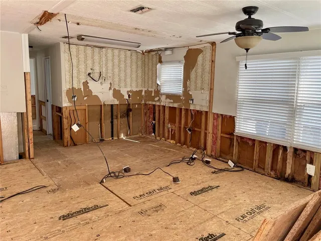 a view of a livingroom with furniture