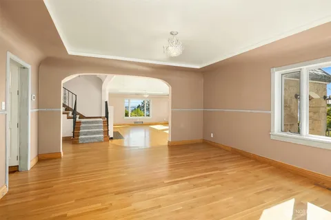 a large kitchen with lots of counter space and stainless steel appliances