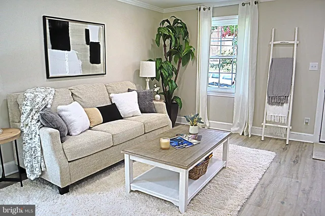 a living room with furniture and window