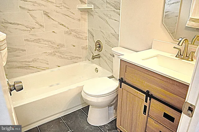a bathroom with a sink and toilet