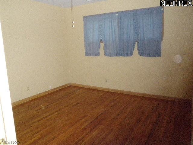1025 Hanley Road Cleveland, OH 44124 - Photo 8 of 11 Second bedroom again with gleeming floors and newly painted, home has natural woodwork thruout