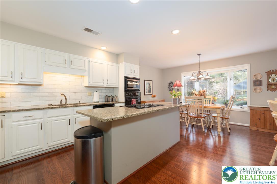 2951 Exeter Drive Emmaus, PA 18049 - Photo 20 of 44 a kitchen with lots of counter top space and dining table