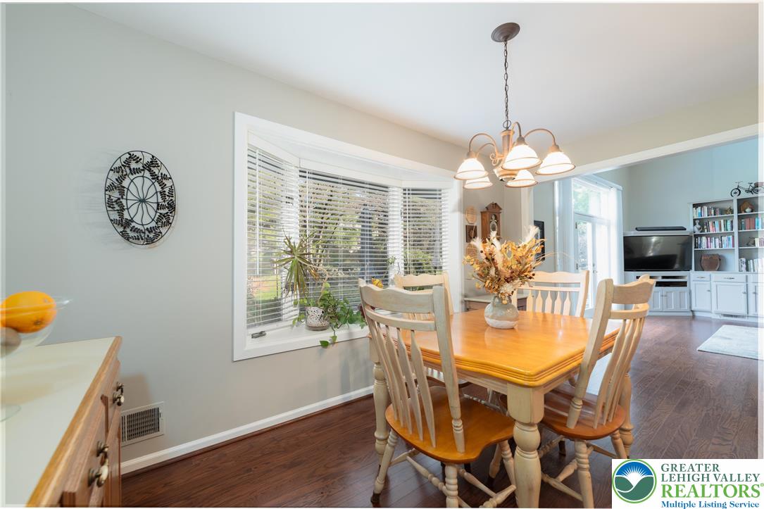 2951 Exeter Drive Emmaus, PA 18049 - Photo 22 of 44 a view of a dining room with furniture window and wooden floor