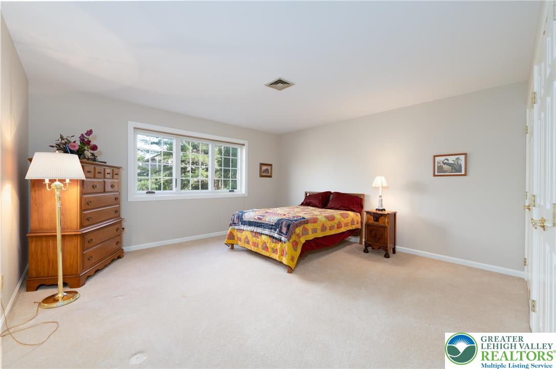 2951 Exeter Drive Emmaus, PA 18049 - Photo 31 of 44 a bedroom with a bed and a window