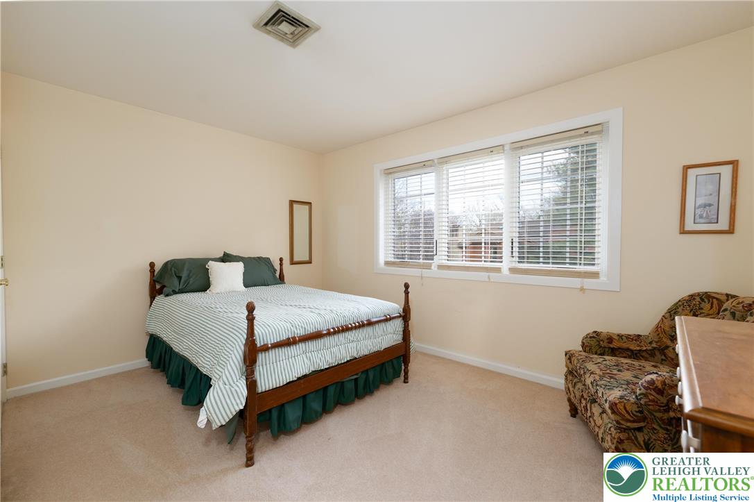 2951 Exeter Drive Emmaus, PA 18049 - Photo 33 of 44 a bedroom with a bed and a window
