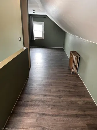 a view of wooden floor in hallway