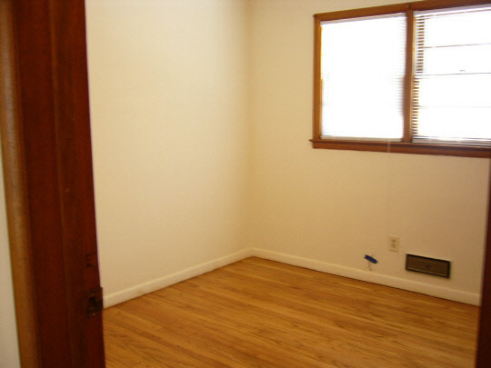 2000 North Alpine Road Rockford, IL 61107 - Photo 8 of 13 a view of a small space with wooden floor and a window