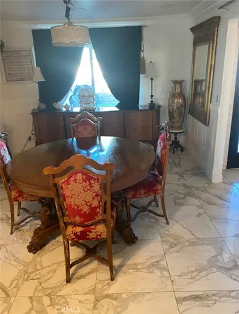 a workspace with furniture and window