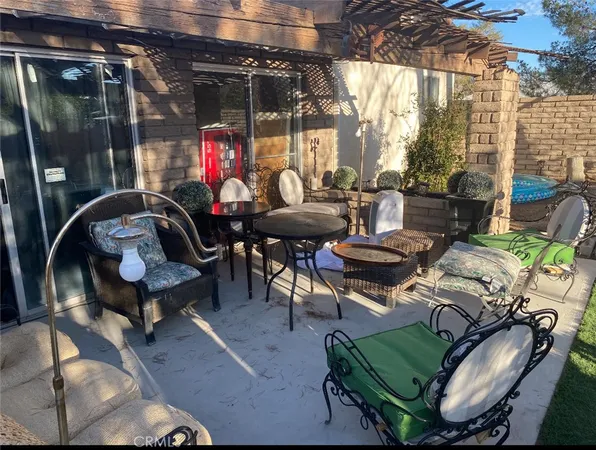a outdoor living space with furniture and outdoor view