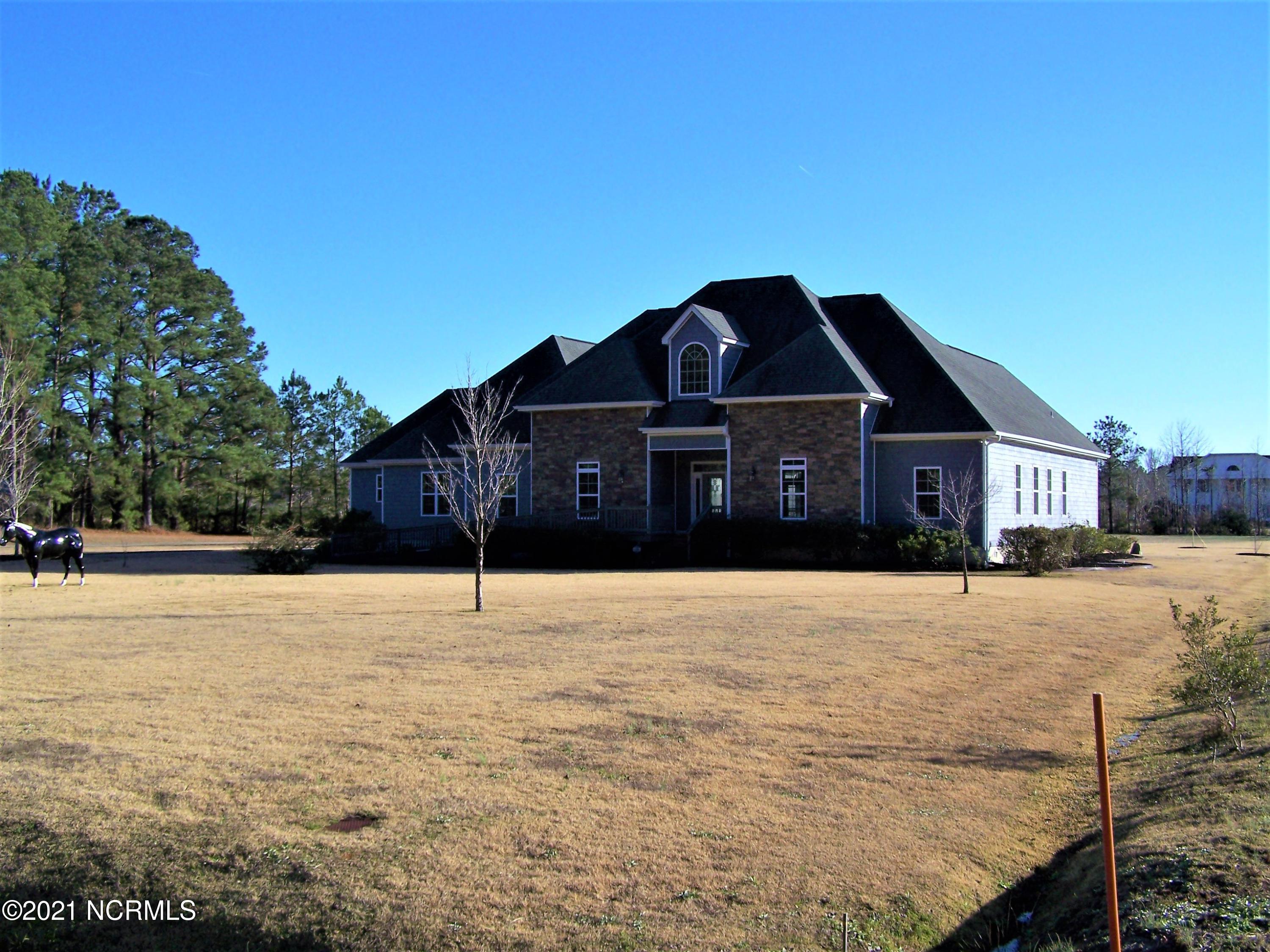 635 Gilbert Road Southeast Bolivia, NC 28422 - Photo 1 of 94 FRONT OF HOME