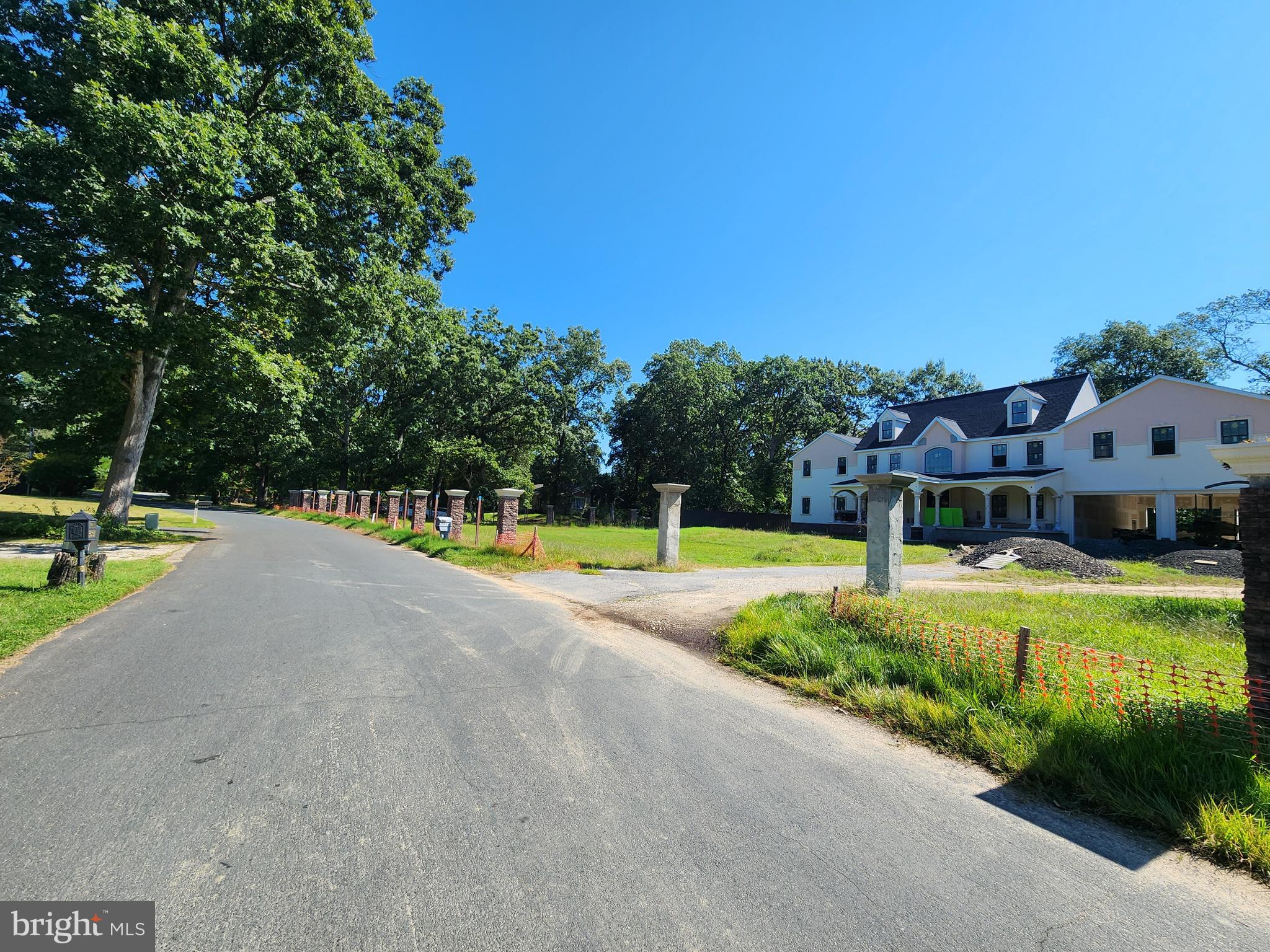 8458 Bussenius Road Pasadena, MD 21122 - Photo 3 of 4 a view of a house with swimming pool and yard