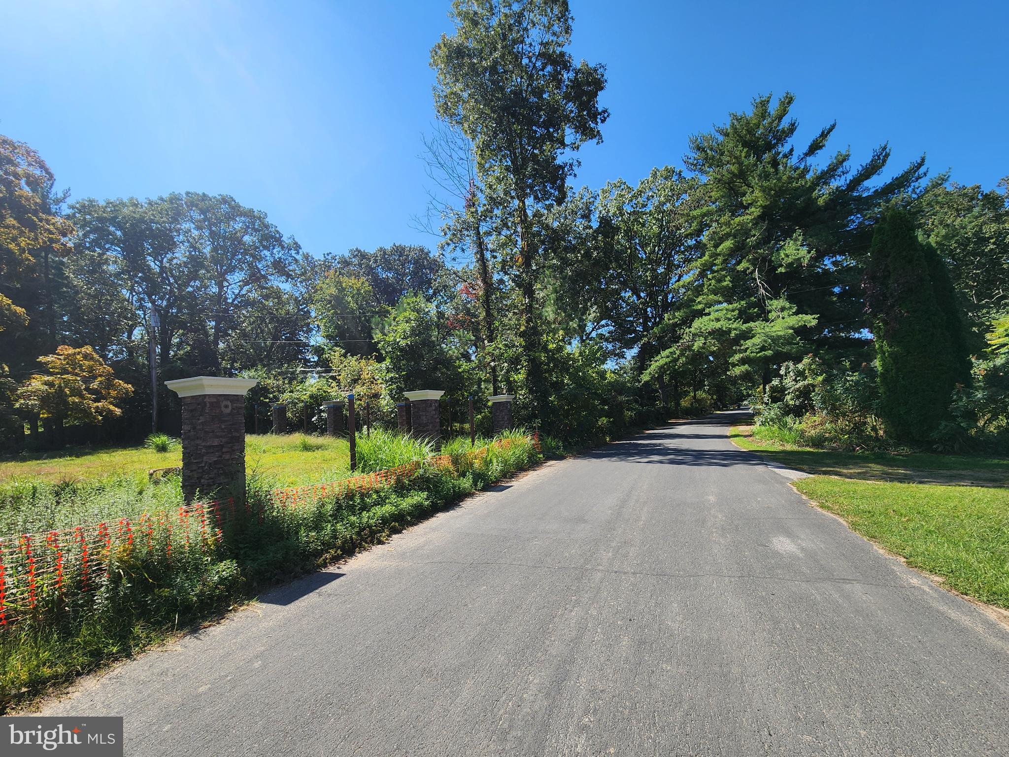 8458 Bussenius Road Pasadena, MD 21122 - Photo 4 of 4 a view of a garden with a lake