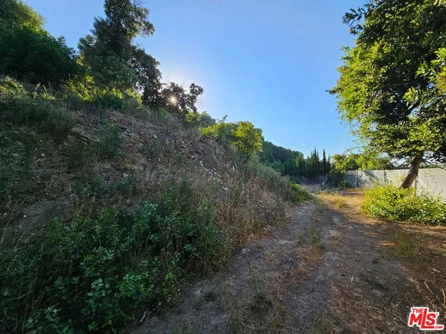 a view of a lake with top of house