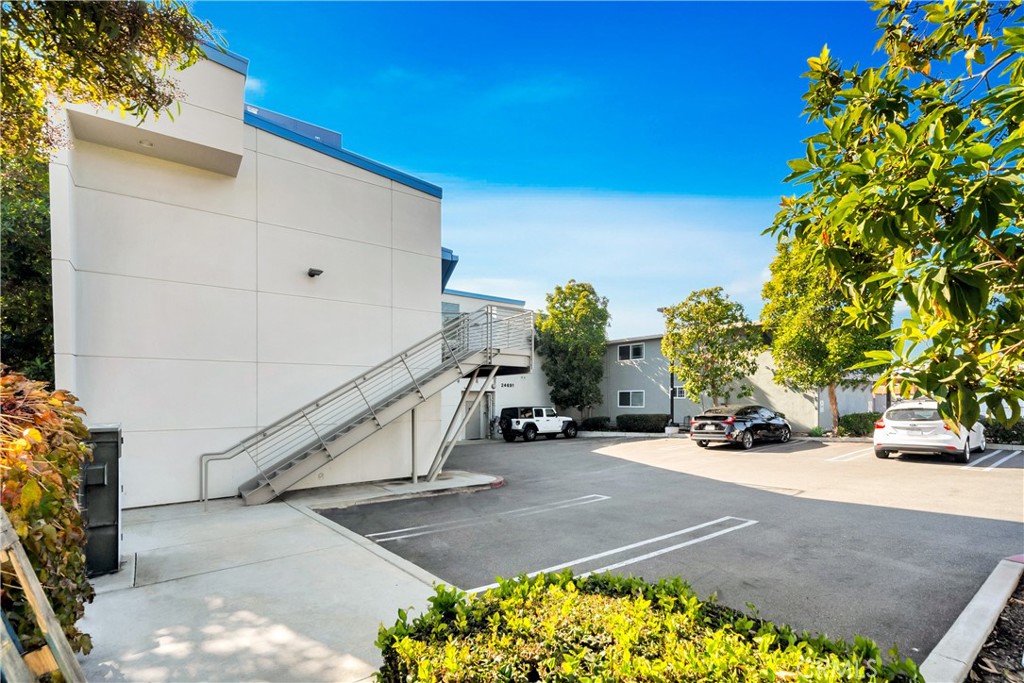 24691 Del Prado Avenue, Unit 100 Dana Point, CA 92629 - Photo 12 of 31 a view of a street with cars