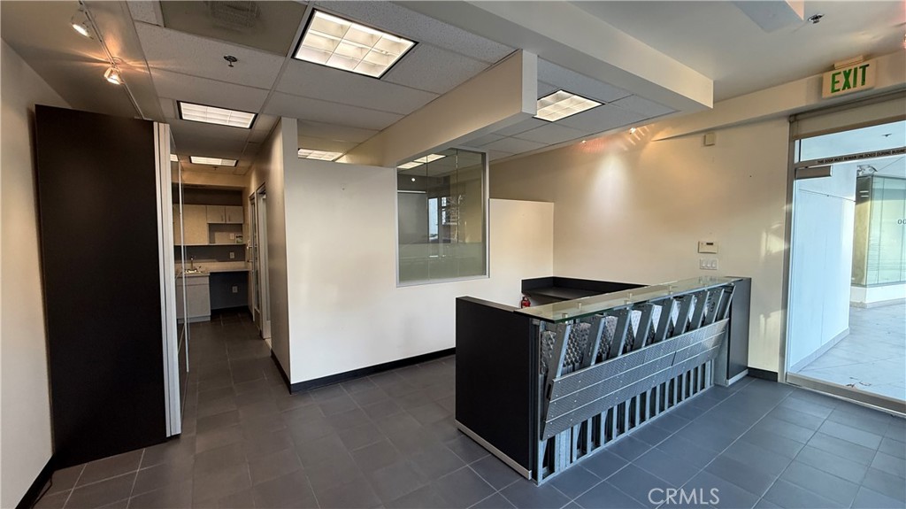 24691 Del Prado Avenue, Unit 100 Dana Point, CA 92629 - Photo 26 of 31 a bedroom with furniture and baby crib