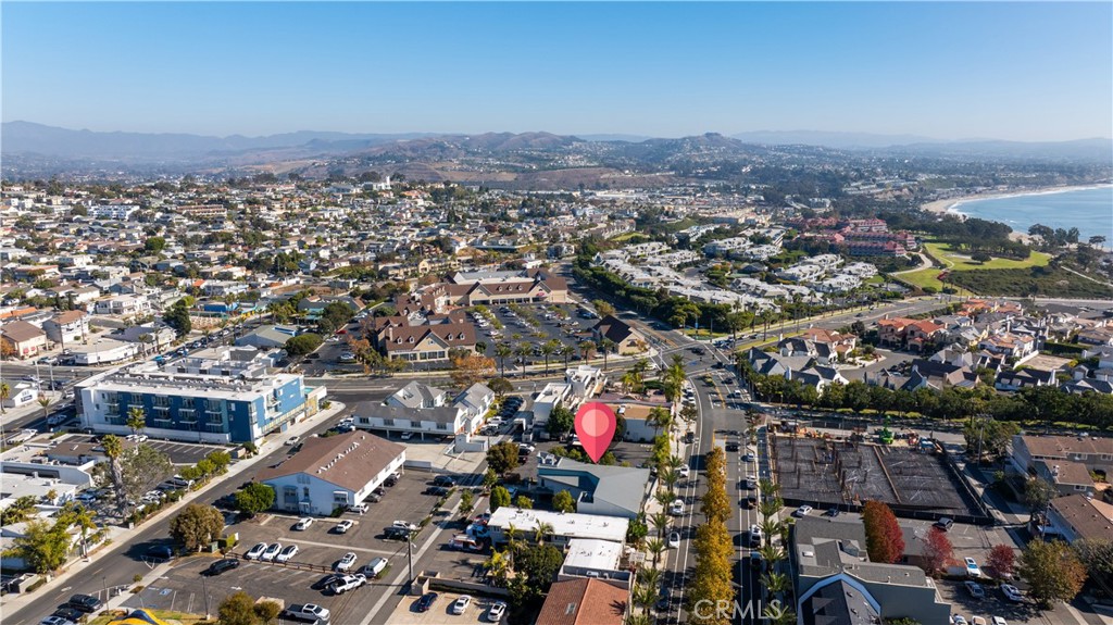 24691 Del Prado Avenue, Unit 100 Dana Point, CA 92629 - Photo 5 of 31 an aerial view of a city