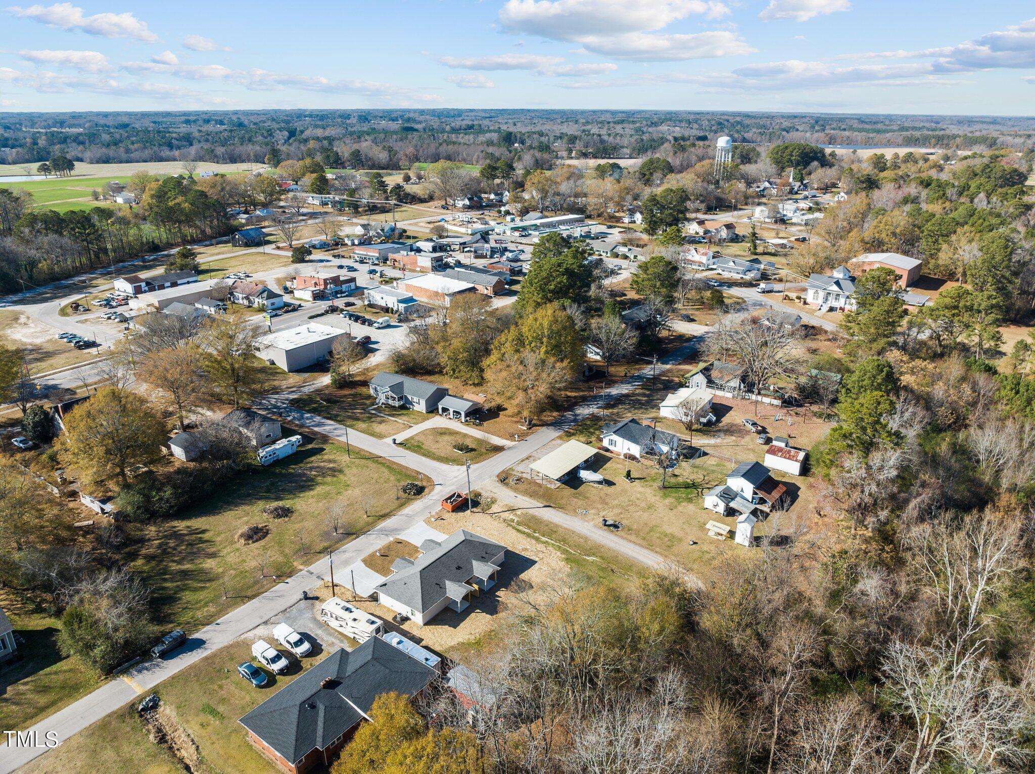207 South Nash Street, Unit AB Bunn, NC 27508 - Photo 22 of 25 an aerial view of residential houses with outdoor space