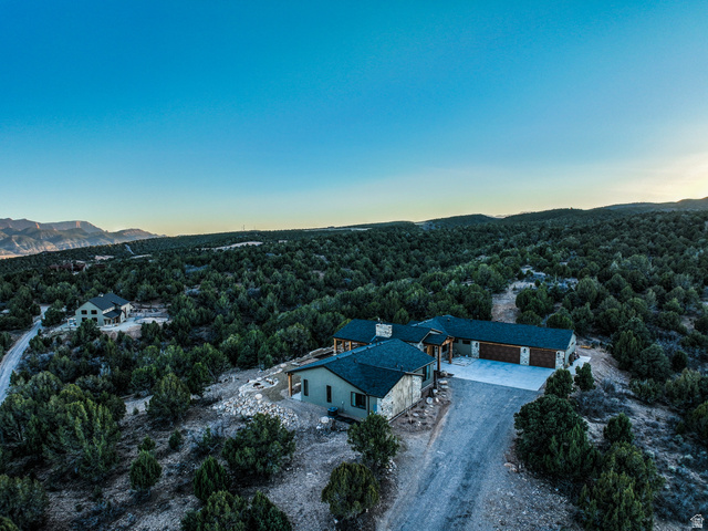 6688 Bareback Road Cedar City, UT 84720 - Photo 38 of 58 Aerial view of property and surrounding area with mountains