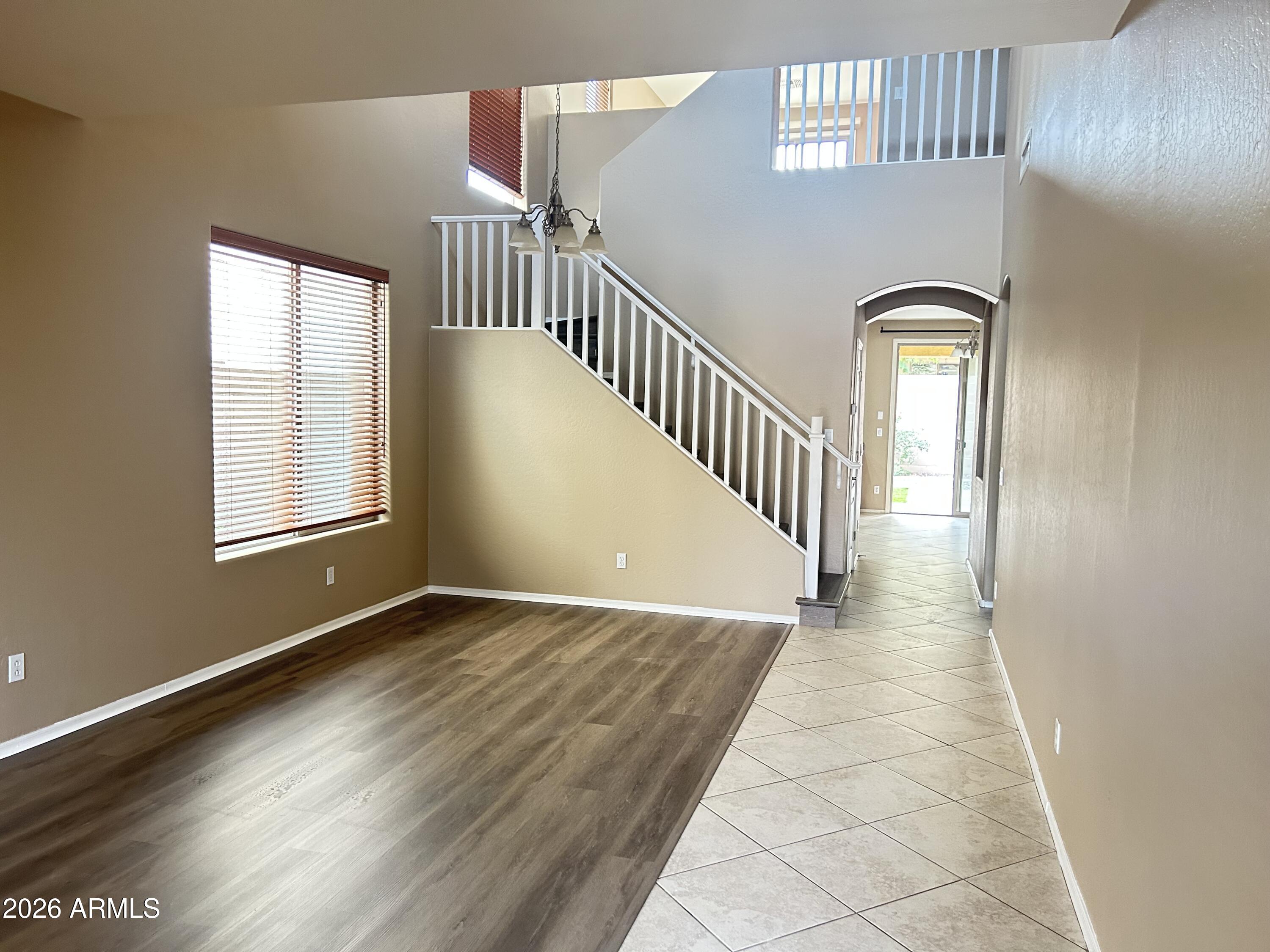 7089 West Eagle Ridge Lane Peoria, AZ 85383 - Photo 12 of 27 a view of an entryway with wooden floor