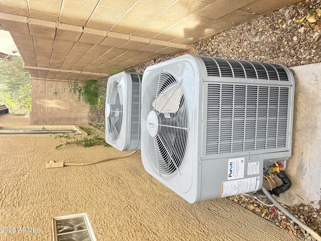 a view of a door and a microwave