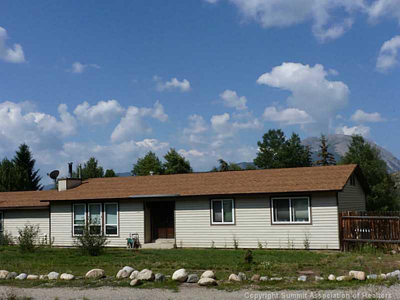 461 Alpine Road Dillon, CO 80435 - Photo 2 of 13 a front view of a house with a yard