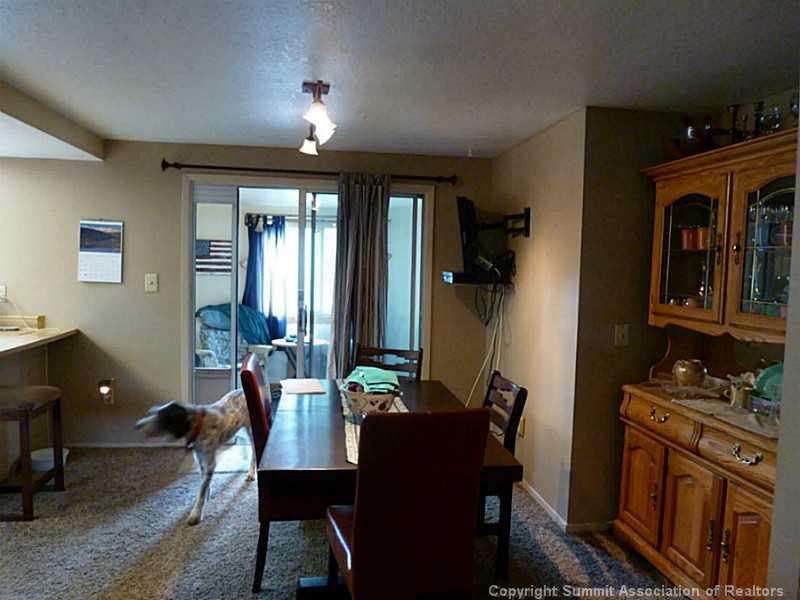 461 Alpine Road Dillon, CO 80435 - Photo 6 of 13 a living room with furniture and a lamp