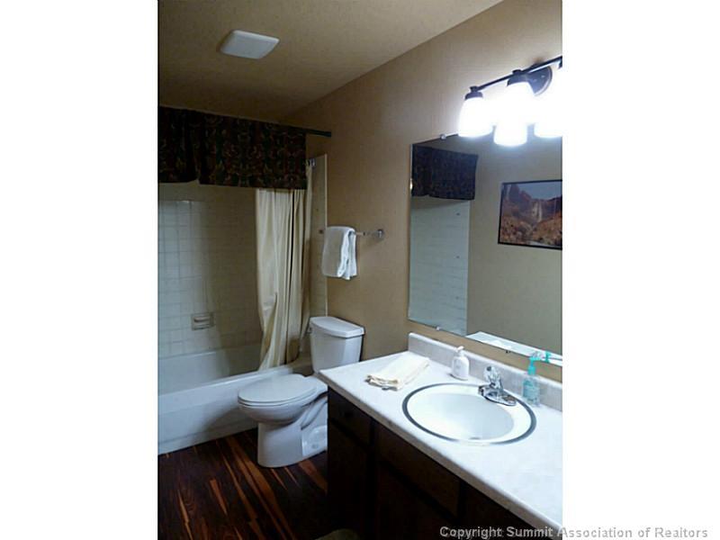461 Alpine Road Dillon, CO 80435 - Photo 9 of 13 a bathroom with a sink toilet and a mirror