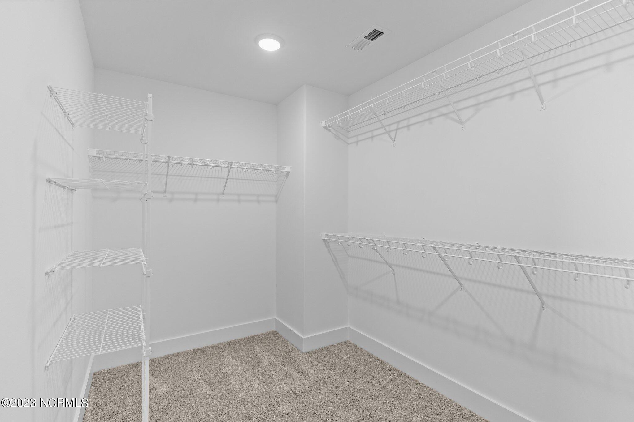 306 Coastline Circle Cedar Point, NC 28584 - Photo 39 of 45 Similar Build- Gabby Floorplan- Primary Master Suite walk-in closet