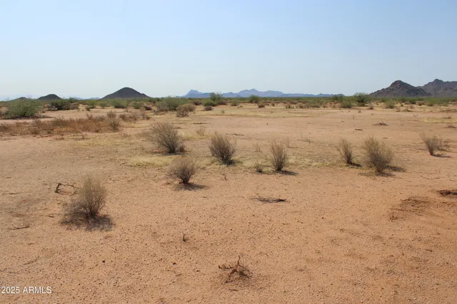 a view of lake with mountain