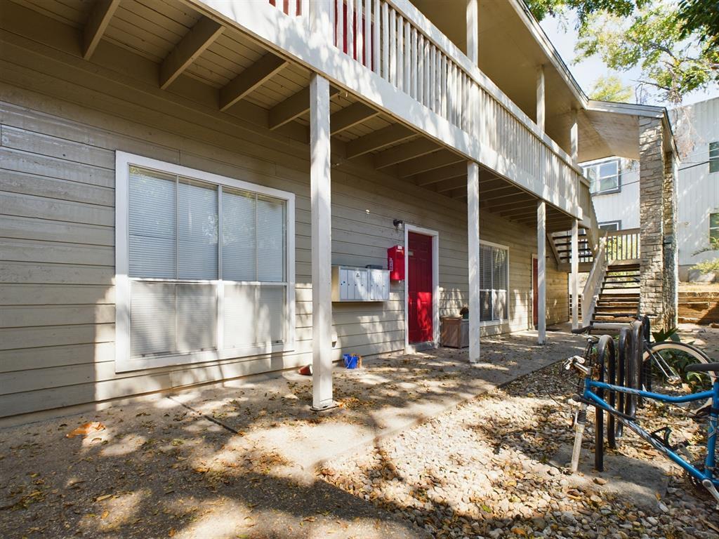 2313 Longview Street, Unit 102 Austin, TX 78705 - Photo 13 of 14 a view of a house with chairs in patio