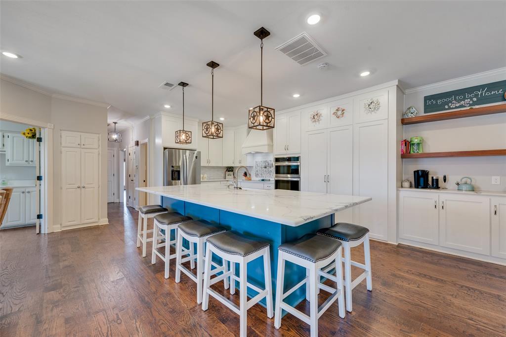 669 VZ County Road Canton, TX 75103 - Photo 14 of 40 Quartz countertops. Huge island great for the whole family in this gorgeous kitchen and dining area.