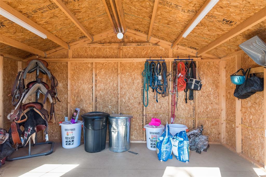 669 VZ County Road Canton, TX 75103 - Photo 32 of 40 View of the red storage building next to the barn. Currently being used as a great tack room.