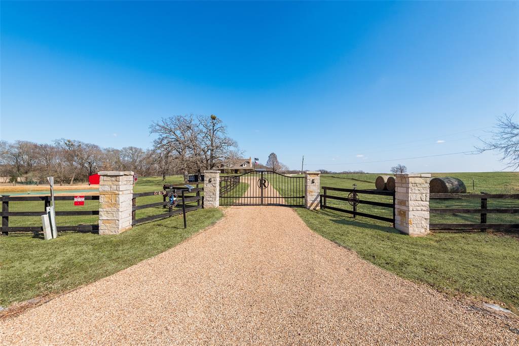 669 VZ County Road Canton, TX 75103 - Photo 4 of 40 View of beautiful gated entrance with stone columns. New chip-seal driveway just installed.