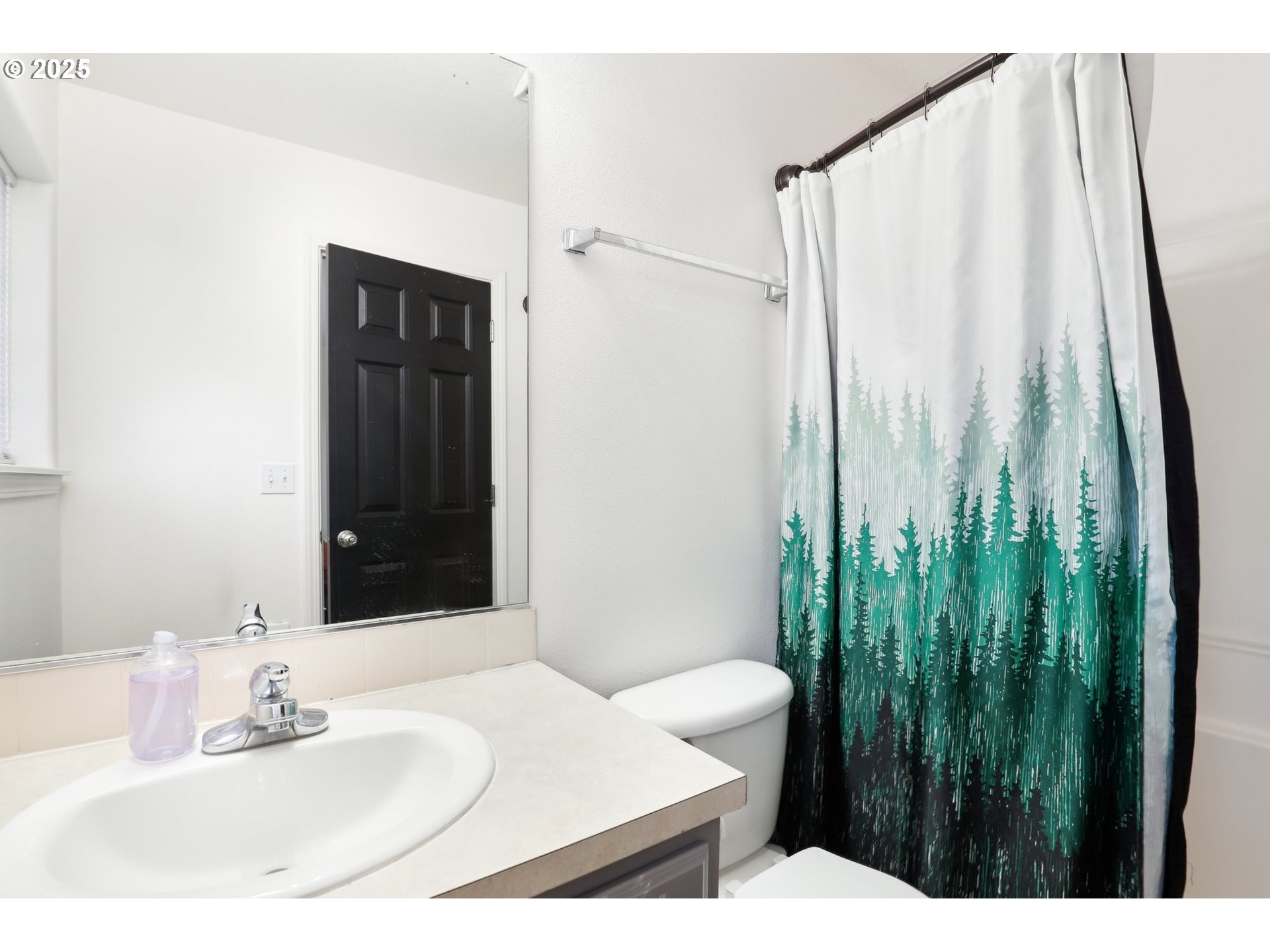 19153 Southeast Yamhill Street, Unit 21 Portland, OR 97233 - Photo 17 of 22 a bathroom with a sink and a mirror
