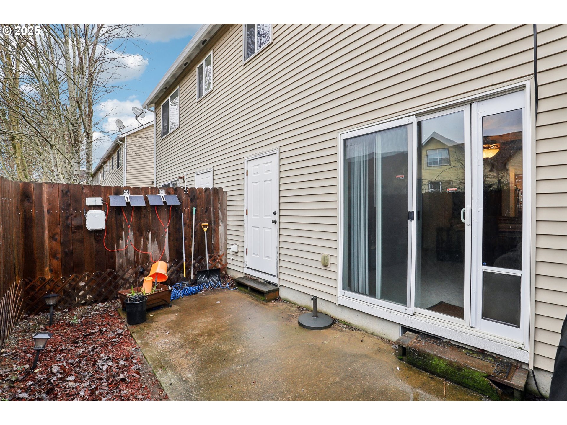 19153 Southeast Yamhill Street, Unit 21 Portland, OR 97233 - Photo 19 of 22 a view of a house with backyard and porch