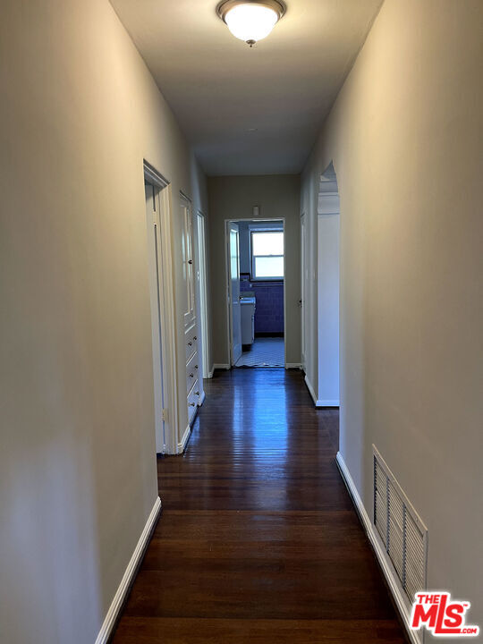 23 Melrose Avenue Pasadena, CA 91105 - Photo 13 of 15 a view of a hallway with wooden floor