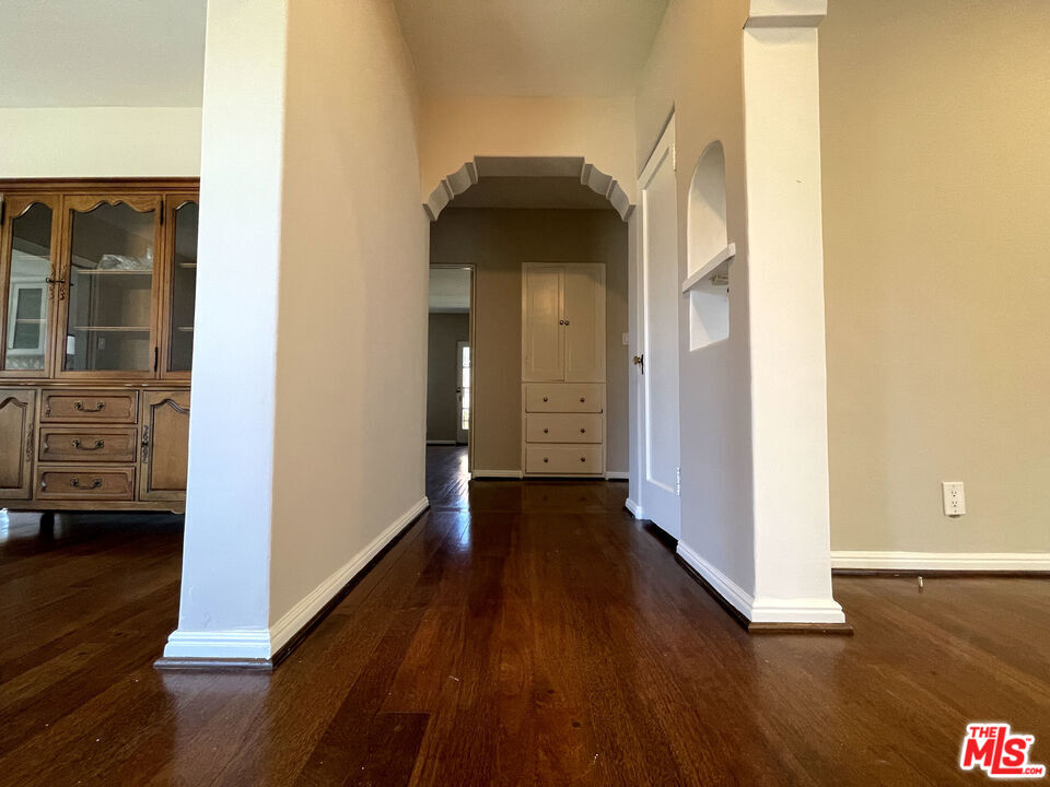 23 Melrose Avenue Pasadena, CA 91105 - Photo 5 of 15 a view of a hallway with wooden floor