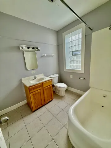 a bathroom with a sink and a bathtub