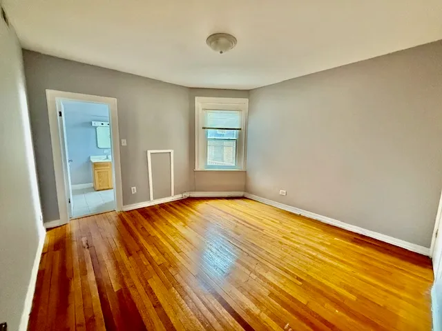 a view of an empty room and window