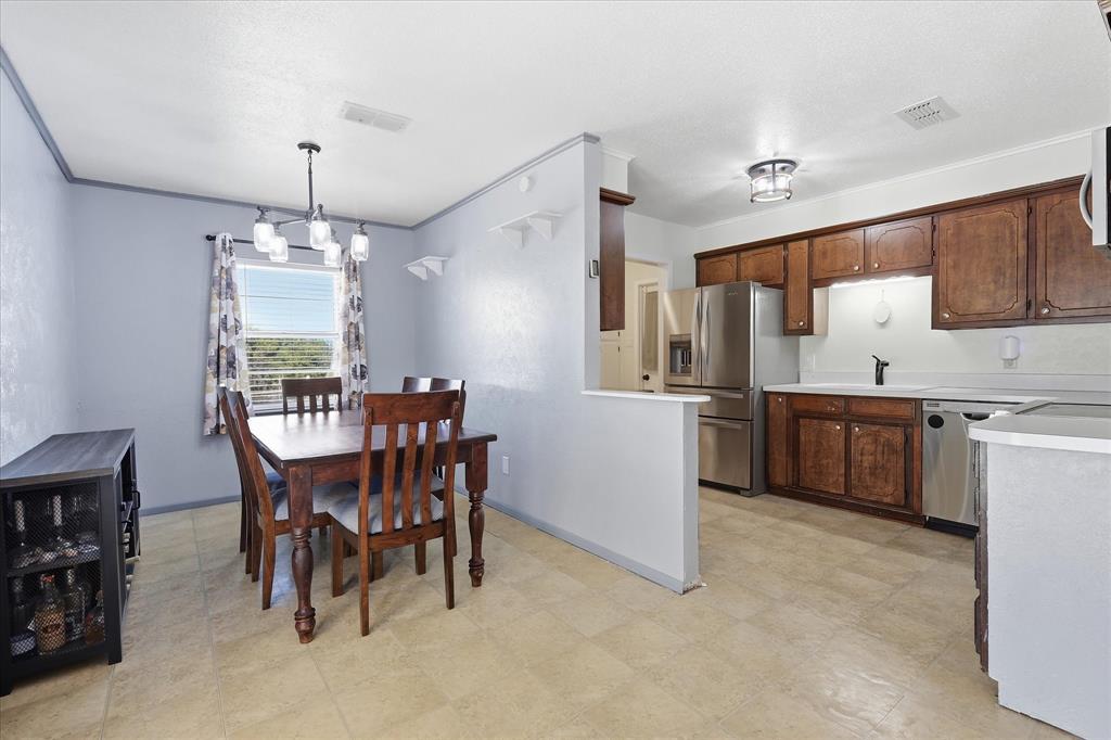 892 Highland Circle Springtown, TX 76082 - Photo 15 of 40 Updated lighting.
