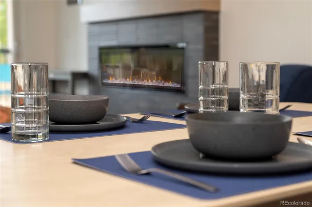 a view of hallway with stairs and wooden floor