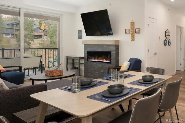 a kitchen with a refrigerator a stove top oven a washer and dryer