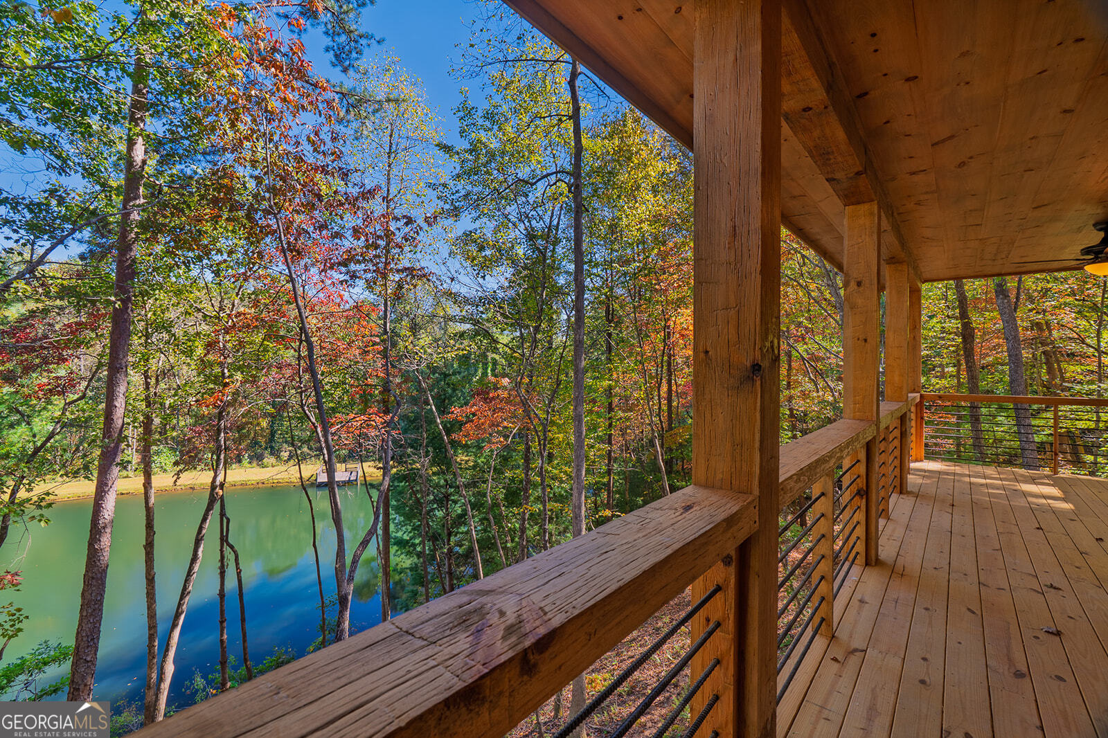 85 Moreland Trail Cherry Log, GA 30522 - Photo 20 of 37 a view of balcony with wooden floor and fence